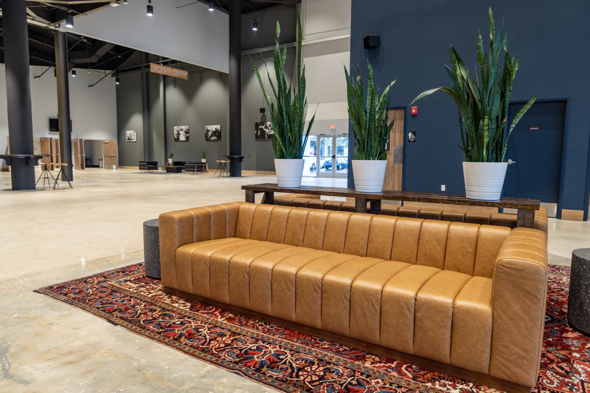 Jacksonville, Florida worship center lobby with leather seating and plants